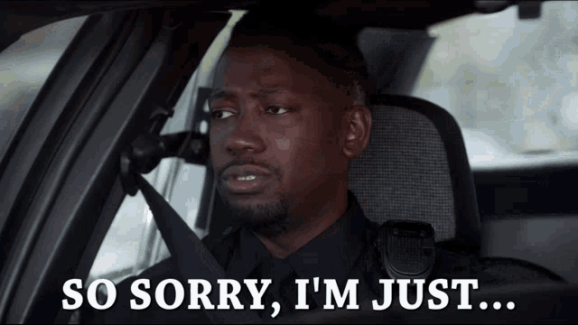 A man sitting in a car, visibly emotional with tears in his eyes, says "SO SORRY, I'M JUST..." in bold text. The GIF captures a moment of vulnerability, conveying deep regret or sorrow.